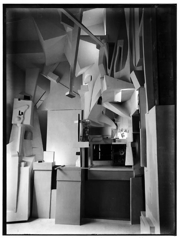 Kurt Schwitters. The Merzbau, transformation of six (or possibly more) rooms of the family house in Hannover, Waldhausenstrasse 5. This took place very gradually; work started in about 1923, the first room was finished in 1933, and Schwitters subsequently extended the Merzbau to other areas of the house until he fled to Norway in early 1937